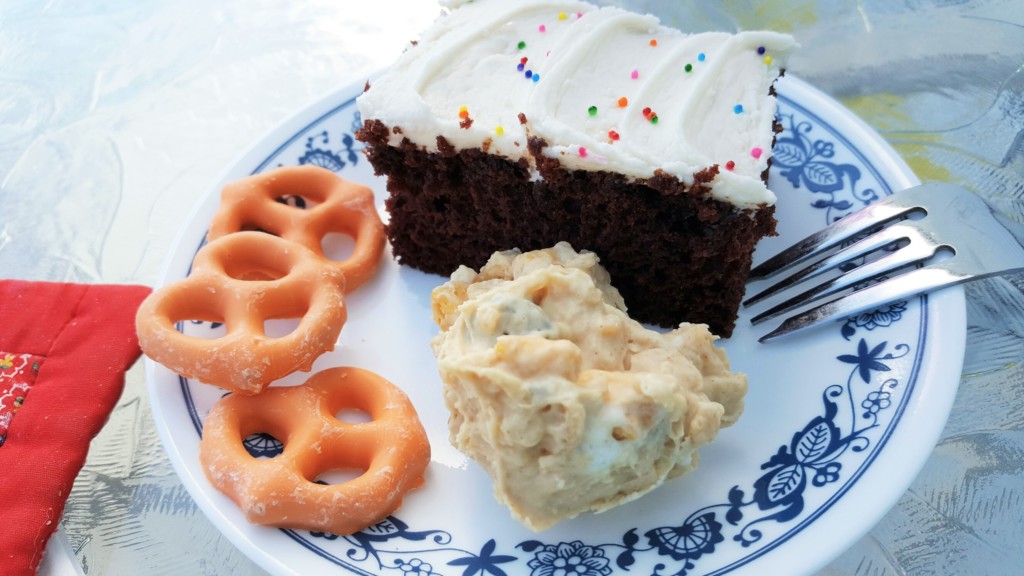 White chocolate-covered pretzels, pumpkin flavored; Cocoa Fudge Cake; Last week's Crunchy Candy Clusters
